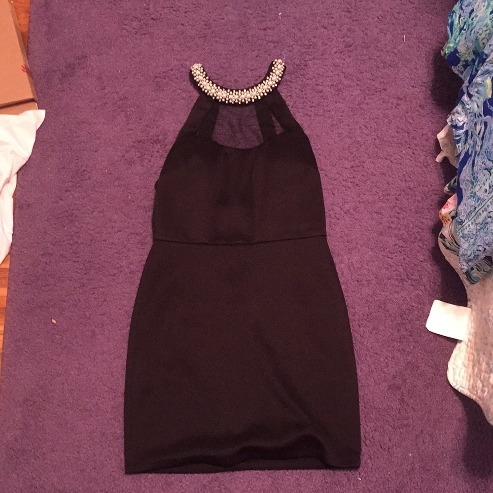 Black dress with pearl neckline